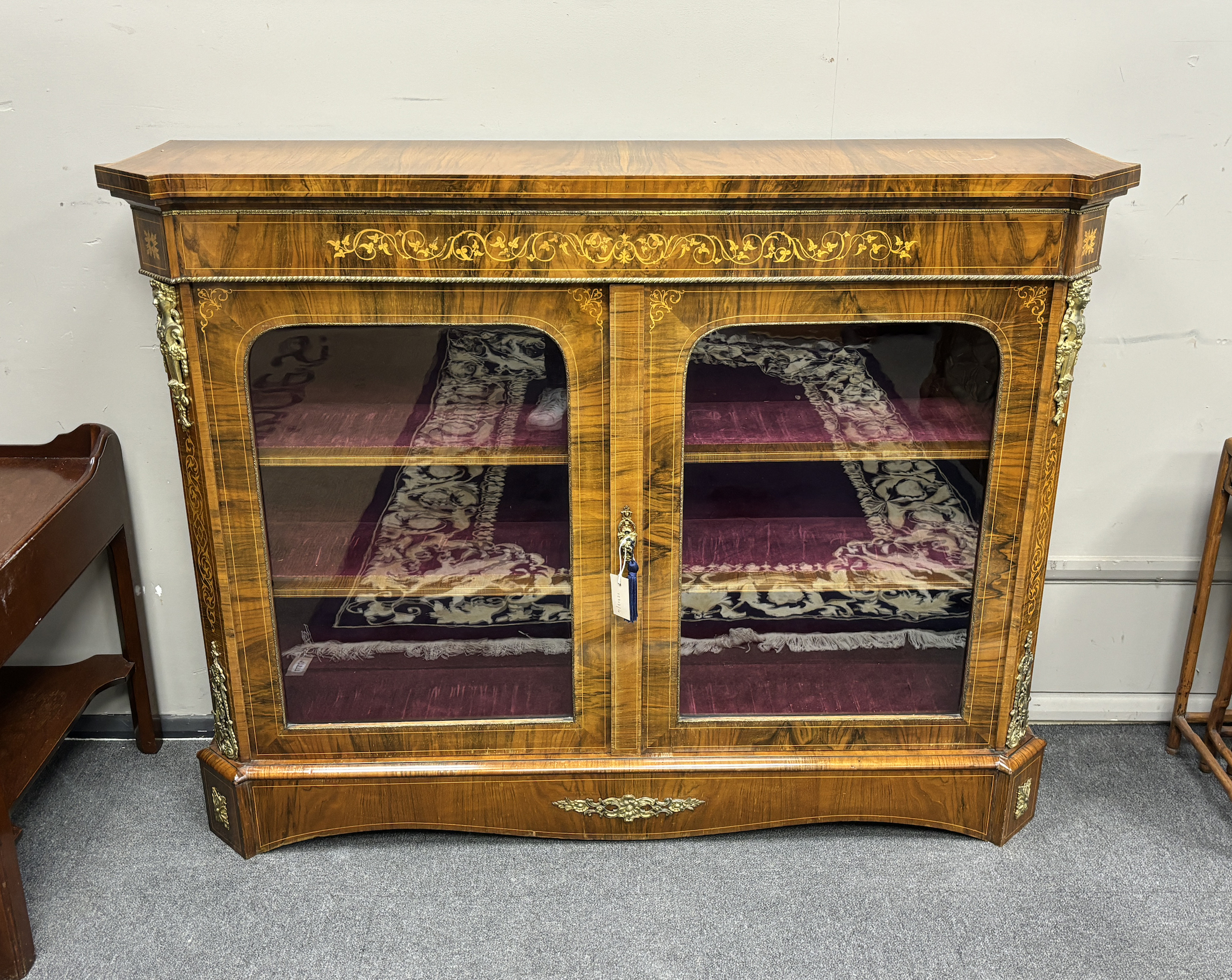 A Victorian figured walnut and marquetry side cabinet, width 143cm, depth 37cm, height 109cm